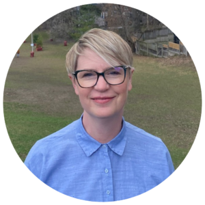 A blond woman with glasses